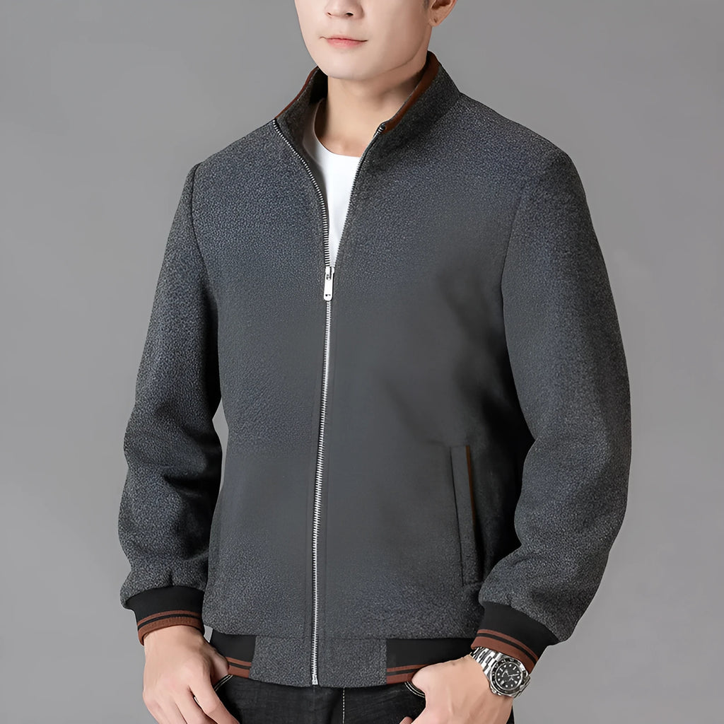 Men's grey sporty fleece jacket with stick pockets, shown on a hanger.