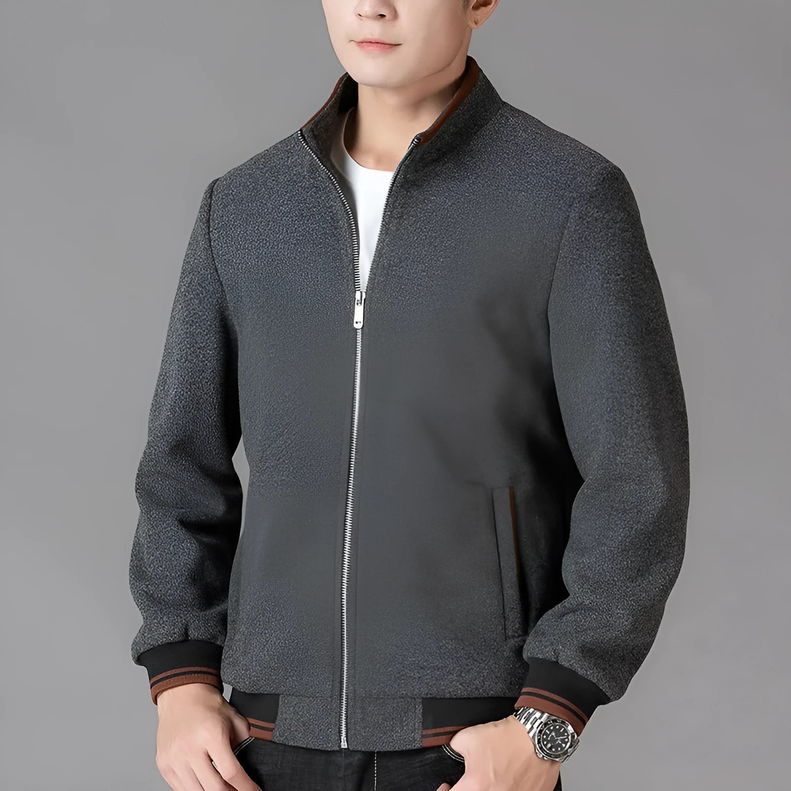 Men's grey sporty fleece jacket with stick pockets, shown on a hanger.