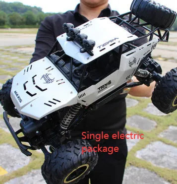 Large 4WD remote control climbing car with 2.4G wireless remote on off-road terrain