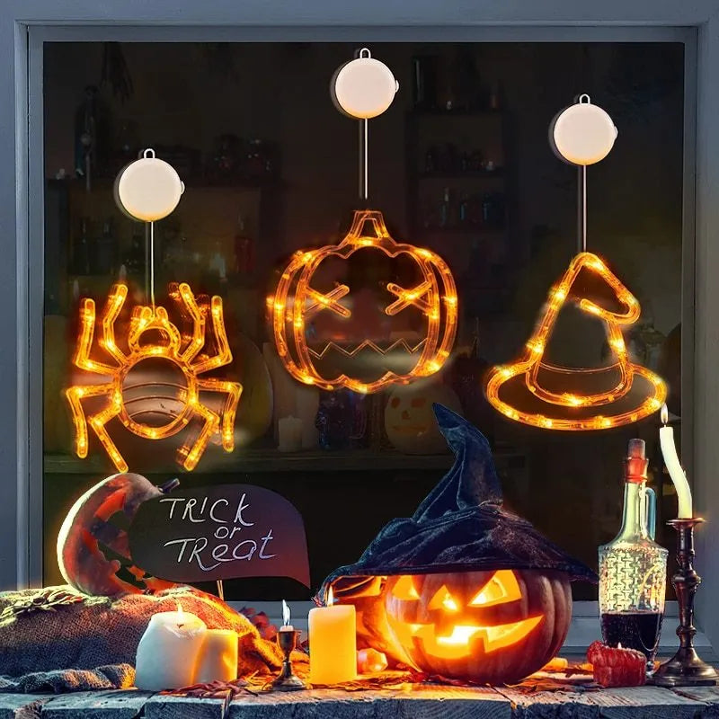 Set of seven Halloween-themed LED hanging lights with suction cups for window display