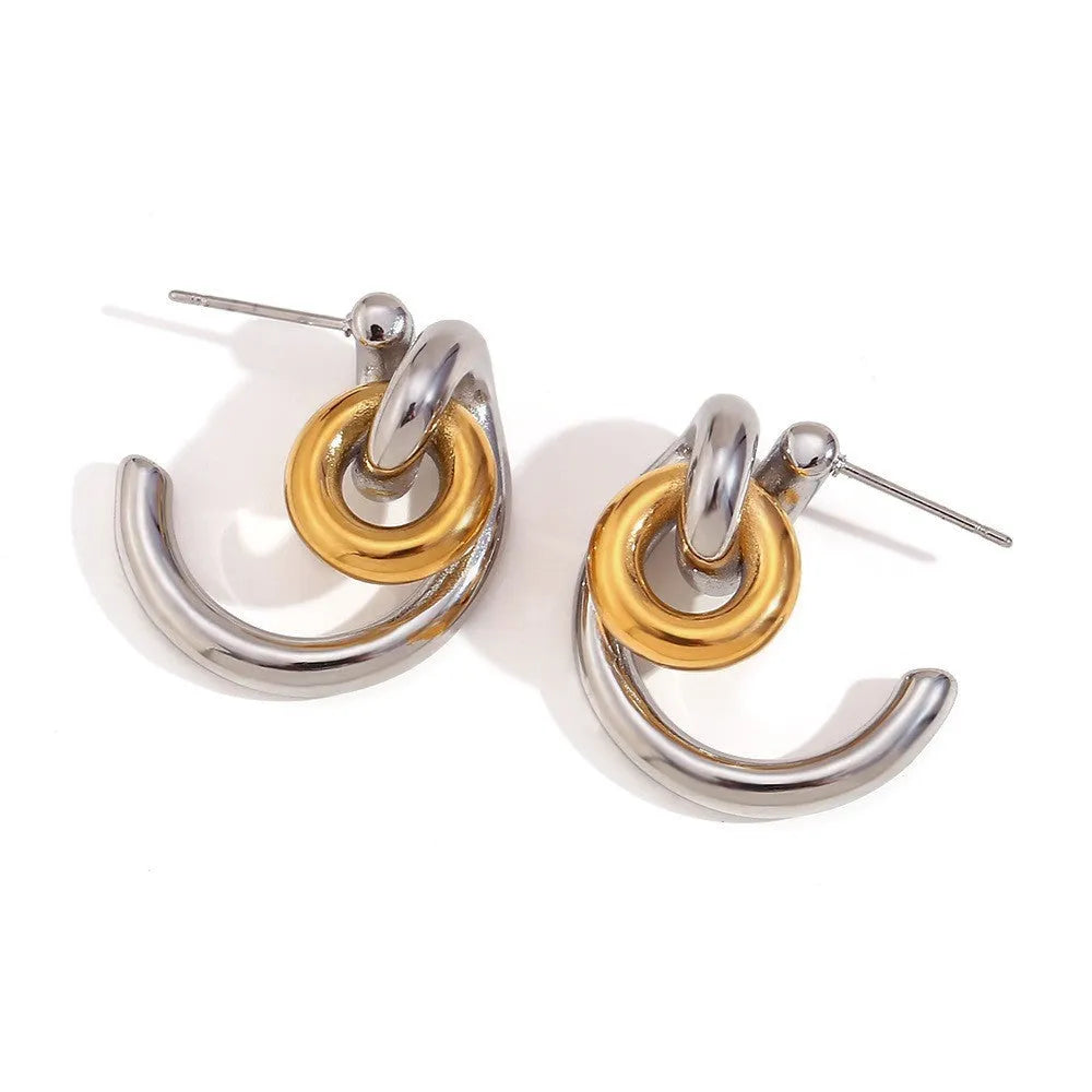 Gold electroplated geometric jewellery set with earrings, bracelet, and necklace on stainless steel