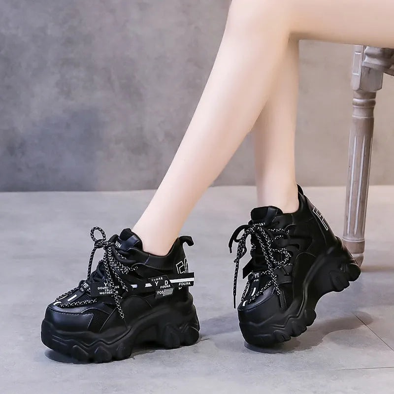 White women's platform tennis shoes with mesh upper and cross strap design