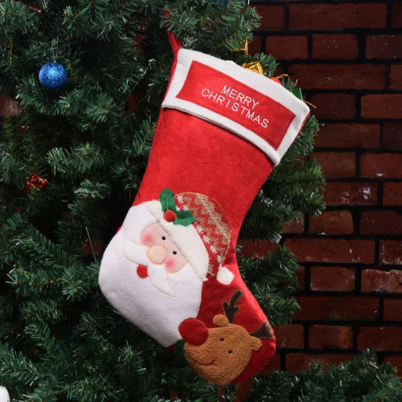 Christmas sock pendant decorations showing elk, Santa, and snowman motifs