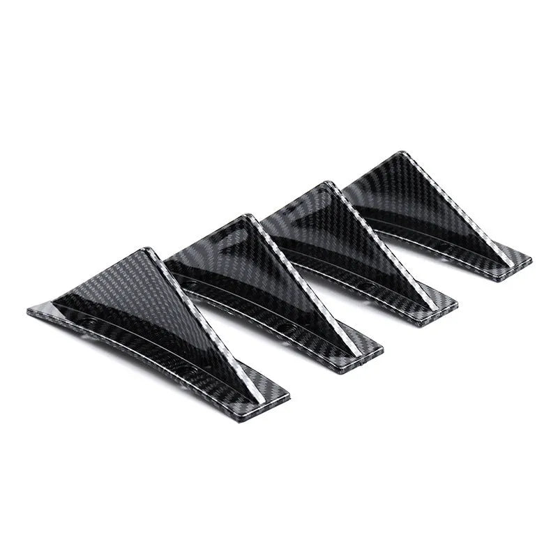 Set of four black ABS plastic triangle rear spoilers for car bumper, measuring 15cm wide, with screws and adhesive tape.