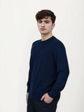 Men's regular fit wool pullover sweater in light grey, shown on a model.