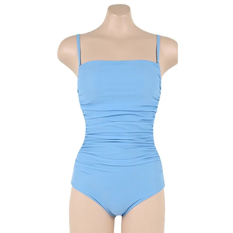 Blue sling style one-piece swimsuit with belly pleating on a mannequin