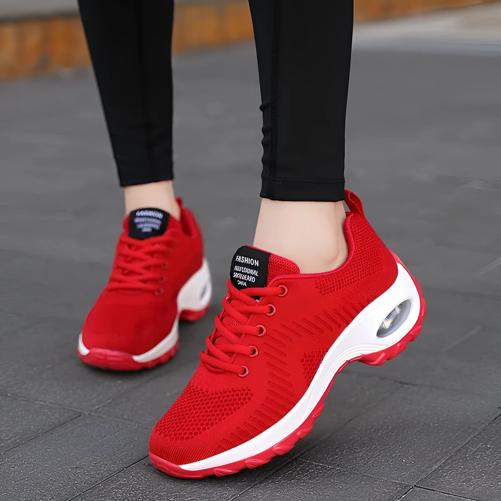 Women's black mesh sneakers with round toe and front lace-up design showing 3-5 cm mid heel