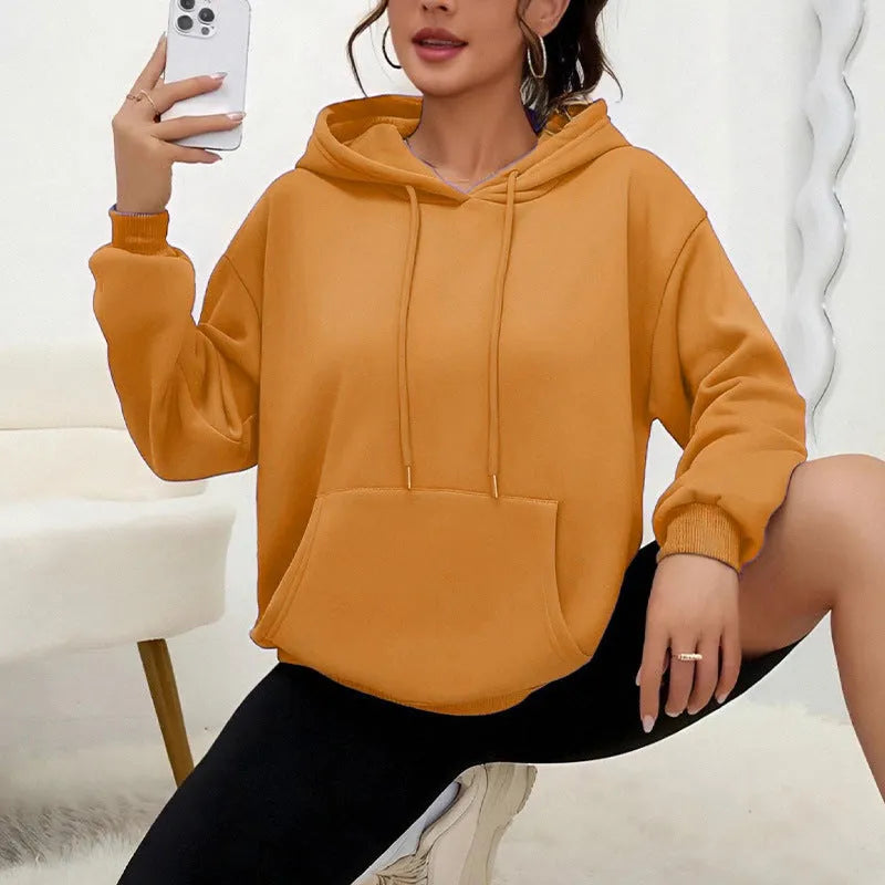 Women's loose fit gray sweatshirt with drawstring waist and front pockets, long sleeve casual top