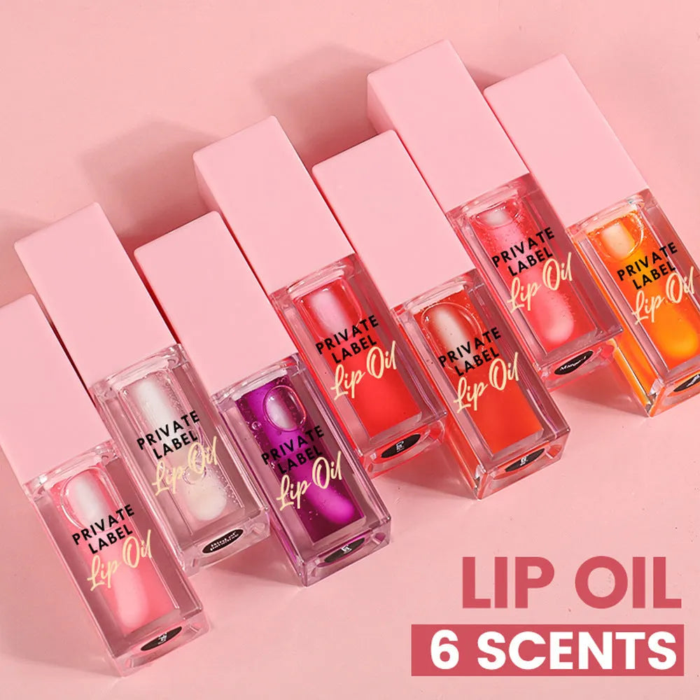 Six transparent lip gloss tubes in fruity flavours: bird of paradise, cherry, coral, mango, strawberry, watermelon