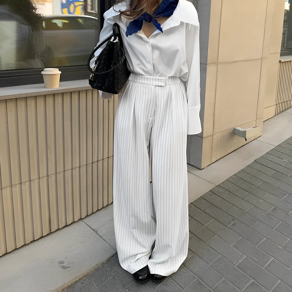 White striped wide-leg women's trousers with front zipper in loose casual fit