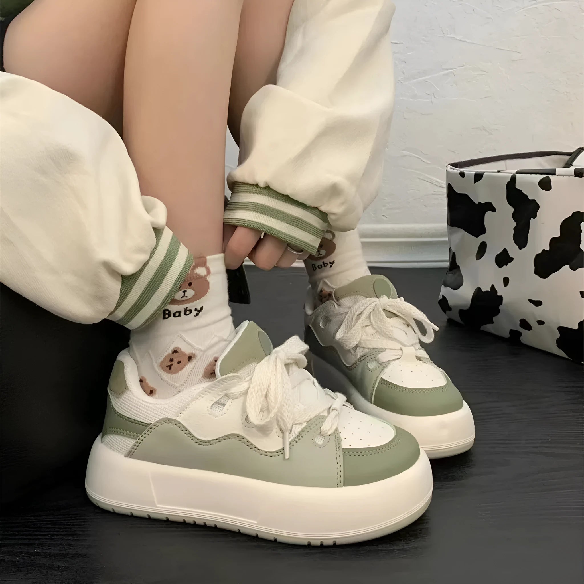 Green women's casual shoes with mesh upper, round toe, and flat heel design