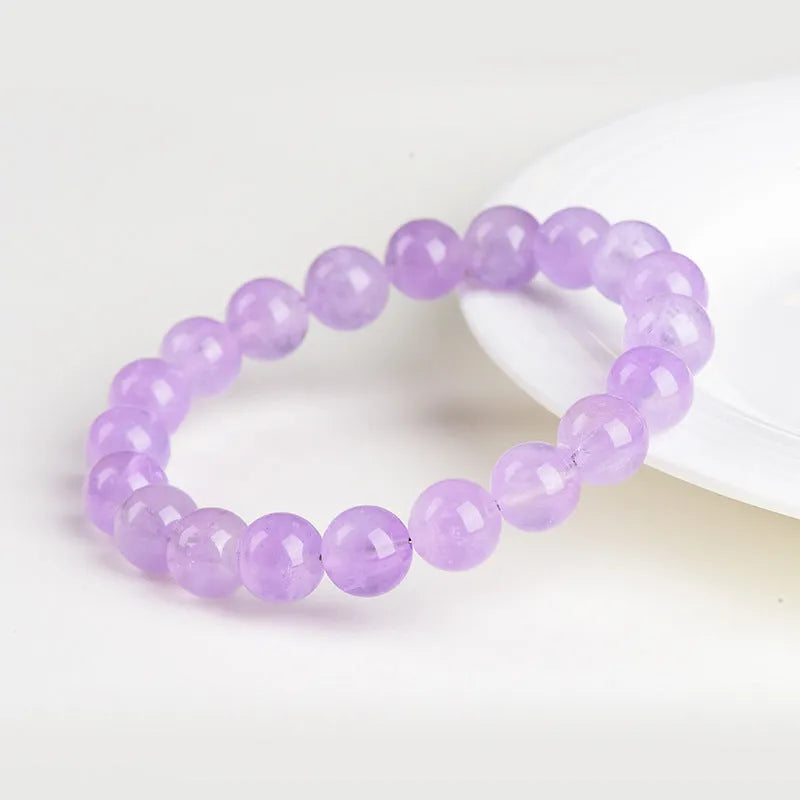 Lavender amethyst round bead bracelet with water ripple pattern showing cream and transparent colour options