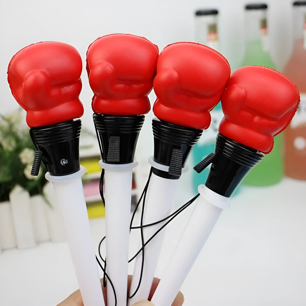 Boxing press ejection pen set showing four pens with plug-in sleeve mechanism and 0.7mm bullet-shaped tips