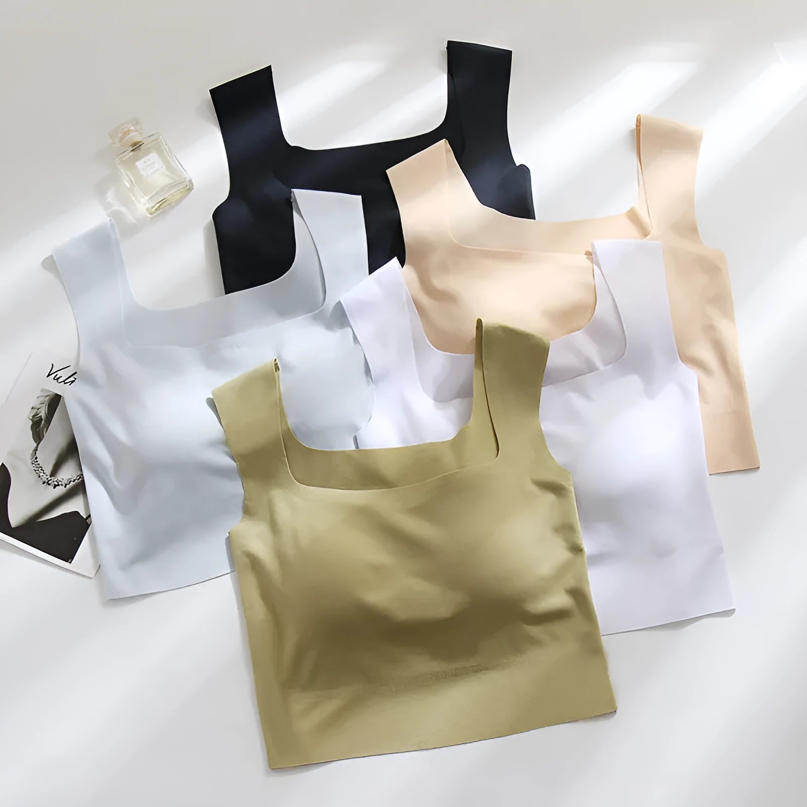 Women's non-marking fixing cup sling vest with chest pad in nylon, shown in light blue colour.