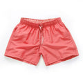Men's straight-leg beach shorts in polyester fabric, shown in multiple colours and plus sizes.