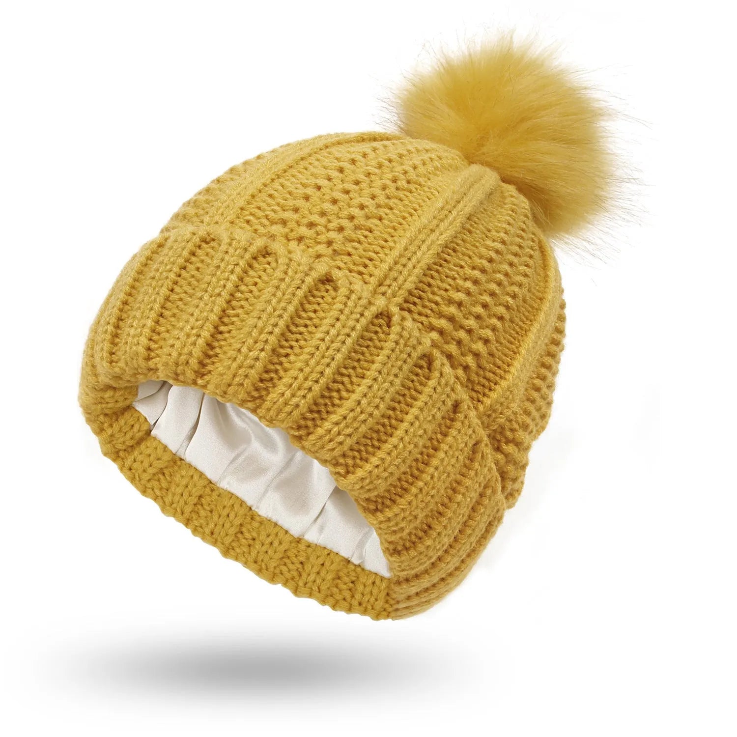 Wool knitted beanie hat with satin lining and faux fur pom pom in beige colour