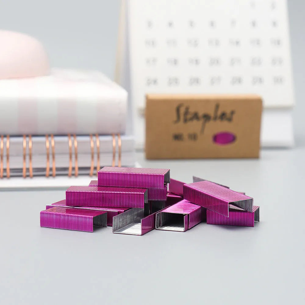 Open box showing 1000 metal staples in a choice of black, purple, rose gold, or rose red colours