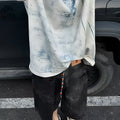 Korean oversized T-shirt in solid colour with round neck and short sleeves
