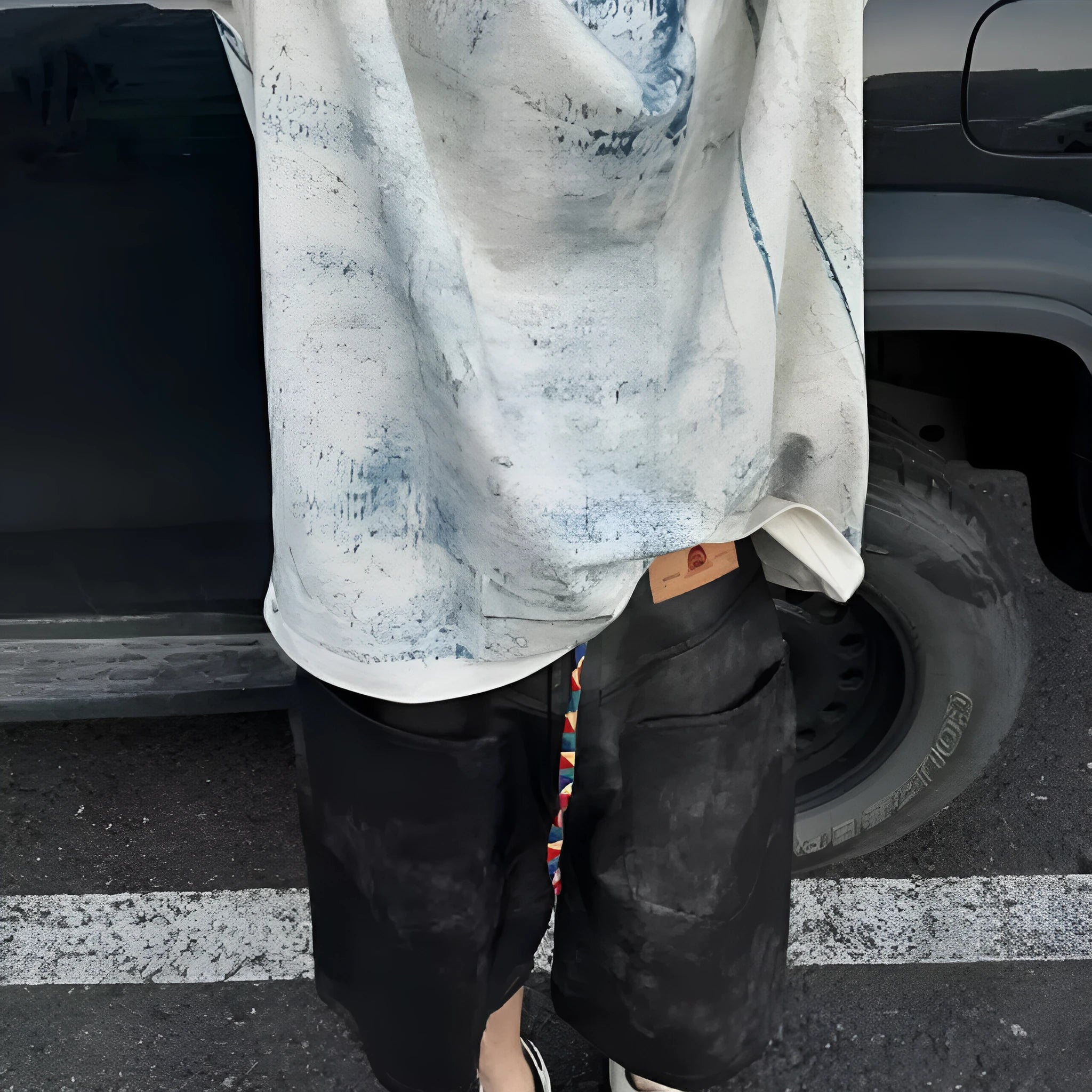 Korean oversized T-shirt in solid colour with round neck and short sleeves
