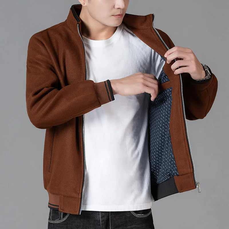 Men's grey sporty fleece jacket with stick pockets, shown on a hanger.