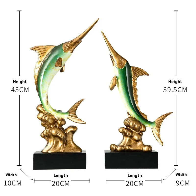 Close-up of a detailed resin European swordfish ornament in bright gold colour on a shelf.