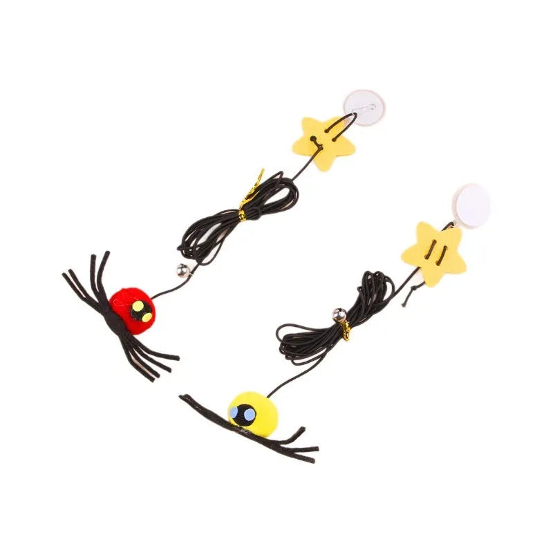 Cat hanging door toy with red feather and bell spider dangling from elastic rope