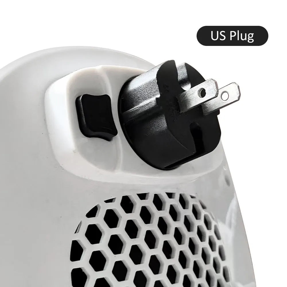 White ceramic heating electric blower with remote control on a desk.