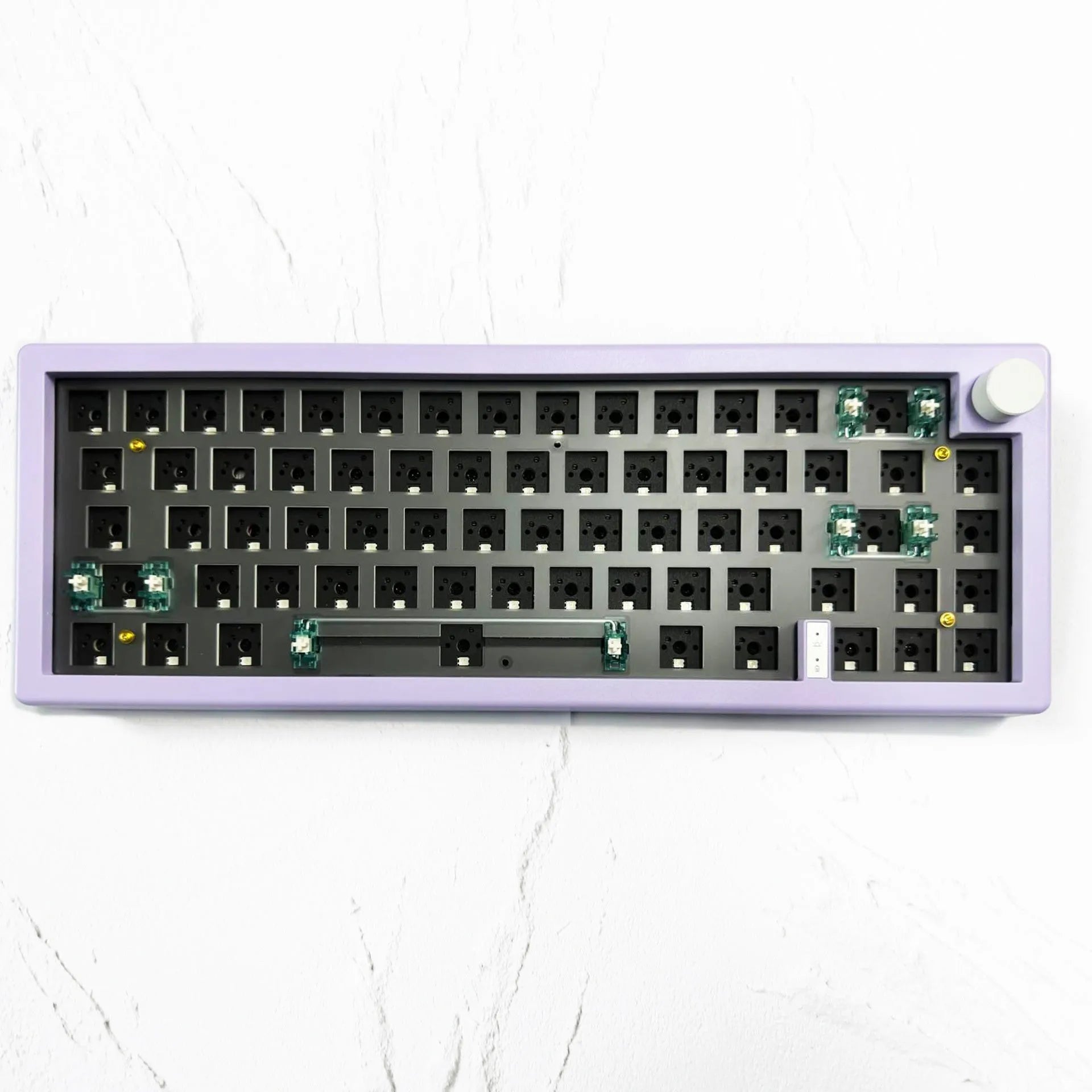 DIY mechanical keyboard kit with RGB lighting in seven colour options showing compact 40cm design