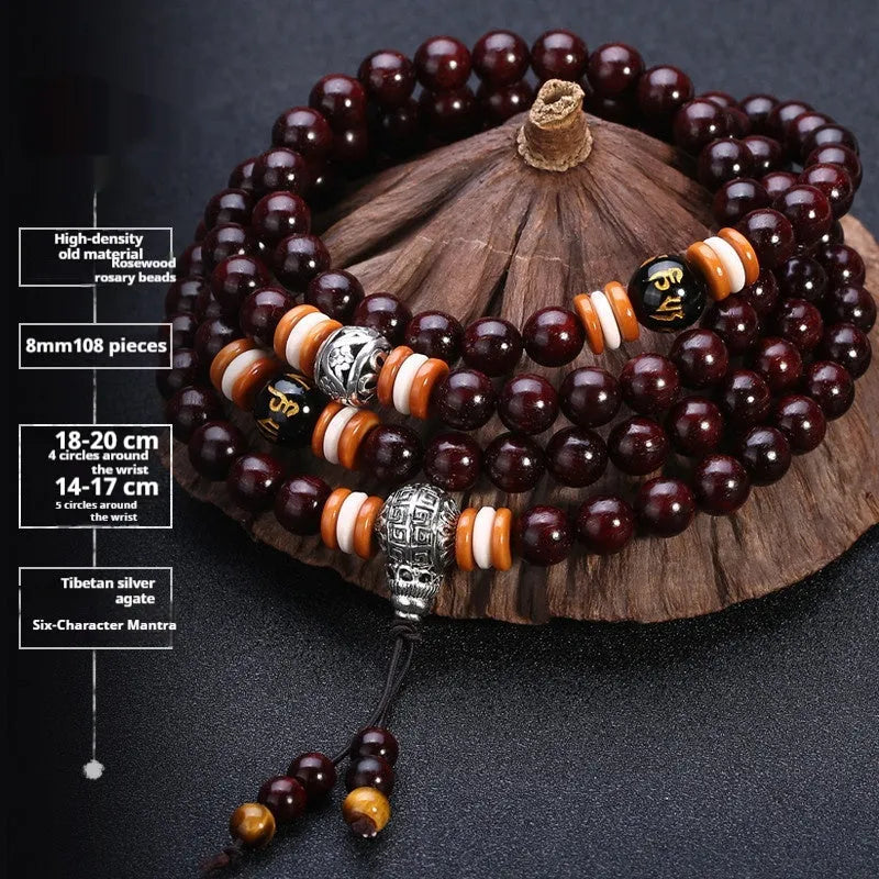 Men's rosewood 108 bead mala bracelet with a turquoise gemstone decorative centrepiece.