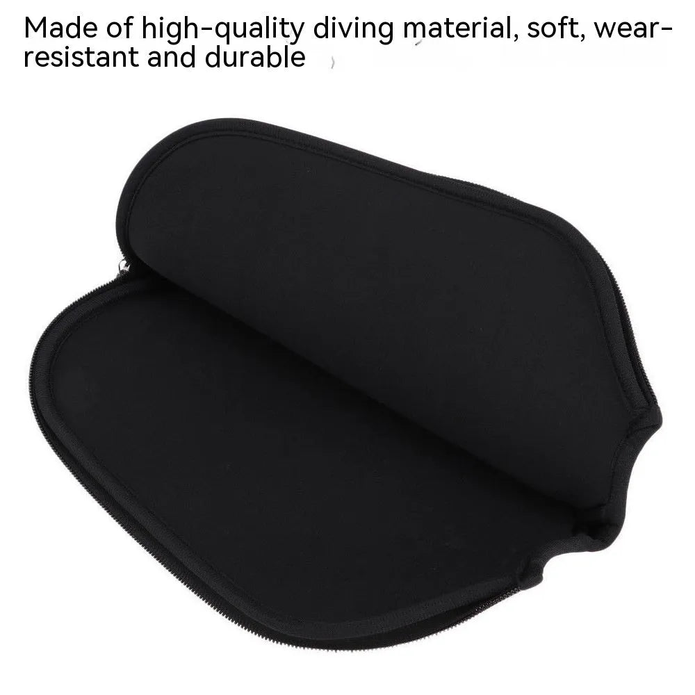 Black neoprene protective sleeve for table tennis racket on a table tennis table