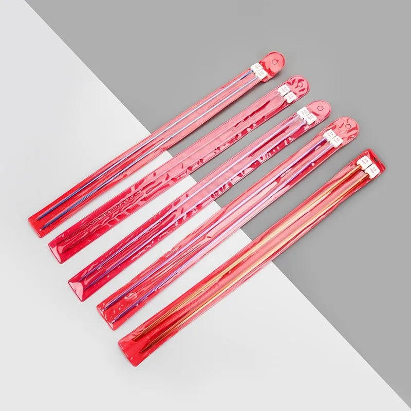 Set of lengthened crochet hooks with protective caps in sizes from 2.0mm to 10.0mm.