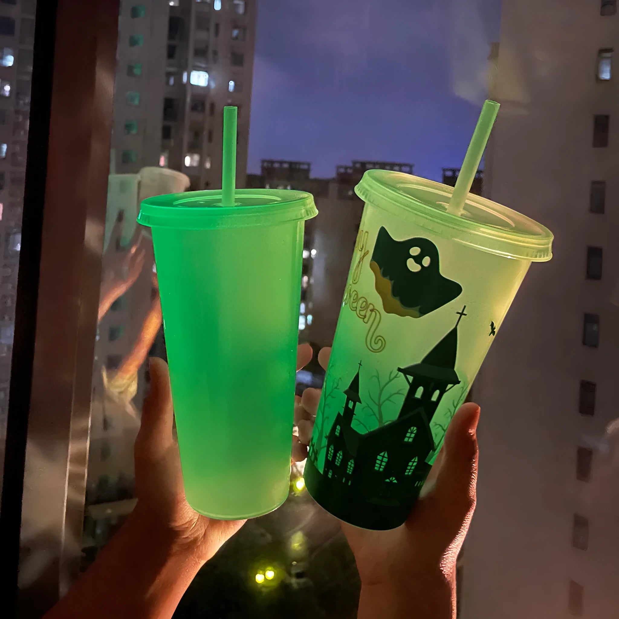 Halloween-themed plastic sippy cup with luminous straw showing six colour options