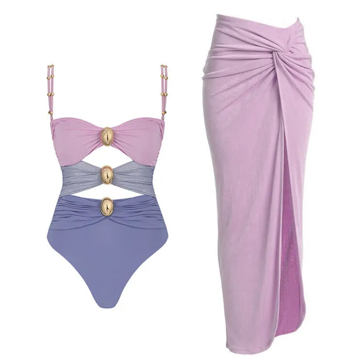 Women's solid colour one-piece swimsuit with a detachable skirt in assorted colours.