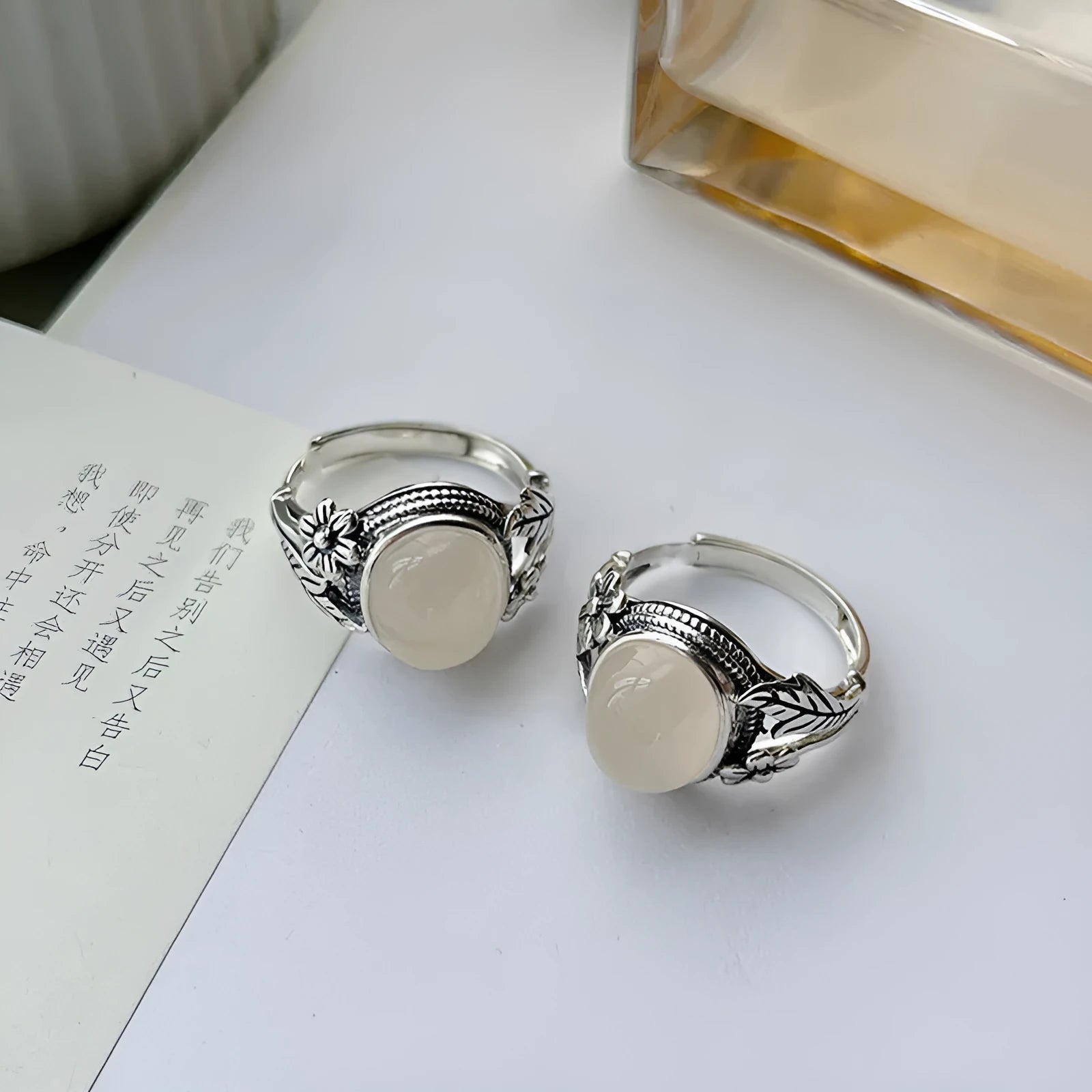 Adjustable copper vintage ring with white chalcedony style colour and U-shaped open mouth design