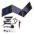 Black foldable solar panel unfolded showing three solar cells with car charger and USB accessories