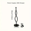 Black aluminium desk lamp with touch dimming controls showing three colour temperature settings