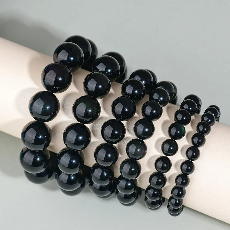 Hand-woven obsidian couple bracelet set with year of birth engraving in ethnic unisex style