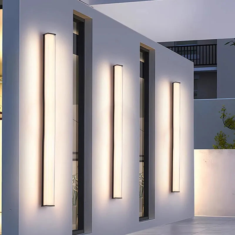 Modern simple outdoor wall lamp shown mounted on an exterior wall, suitable for villa or hotel entrance.