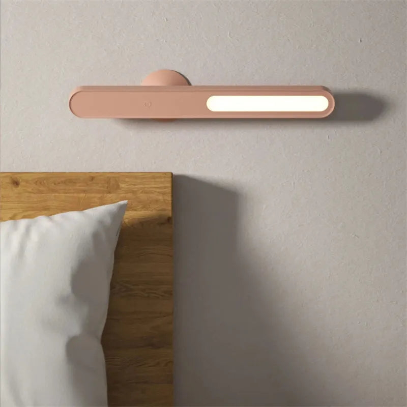 Geometric wireless table lamp with magnetic base in white colour showing touch controls