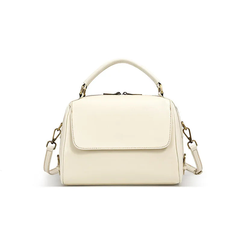 Genuine leather crossbody tote bag in a cross square shape with double straps and internal organiser pockets.