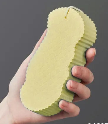 3D fish scale pattern bath sponge in white, grey, pink, or light blue colours for gentle body exfoliation