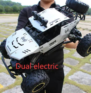 Large 4WD remote control climbing car with 2.4G wireless remote on off-road terrain