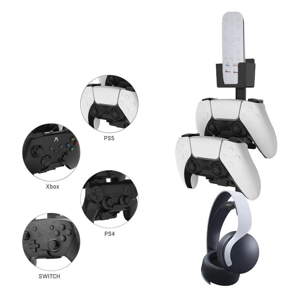 White wall-mounted hook holding PS5 controller and gaming headset
