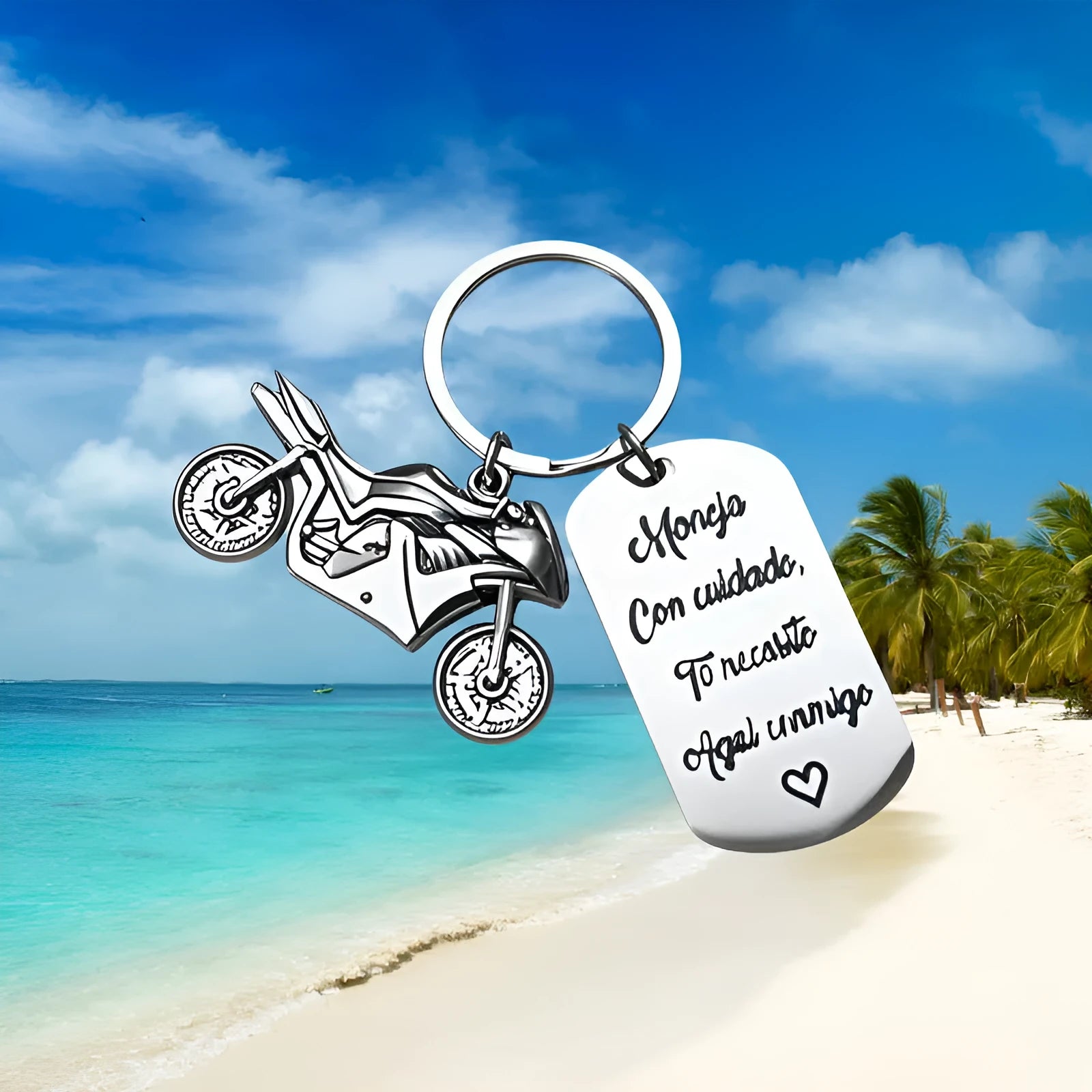 Stainless steel motorcycle keychain with velvet gift pouch in modern minimalist design