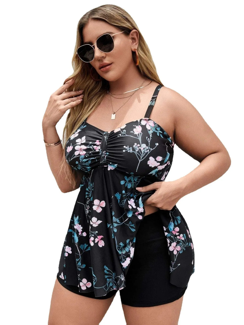Women's one-piece floral print swimsuit with split colours, shown in extended sizes.