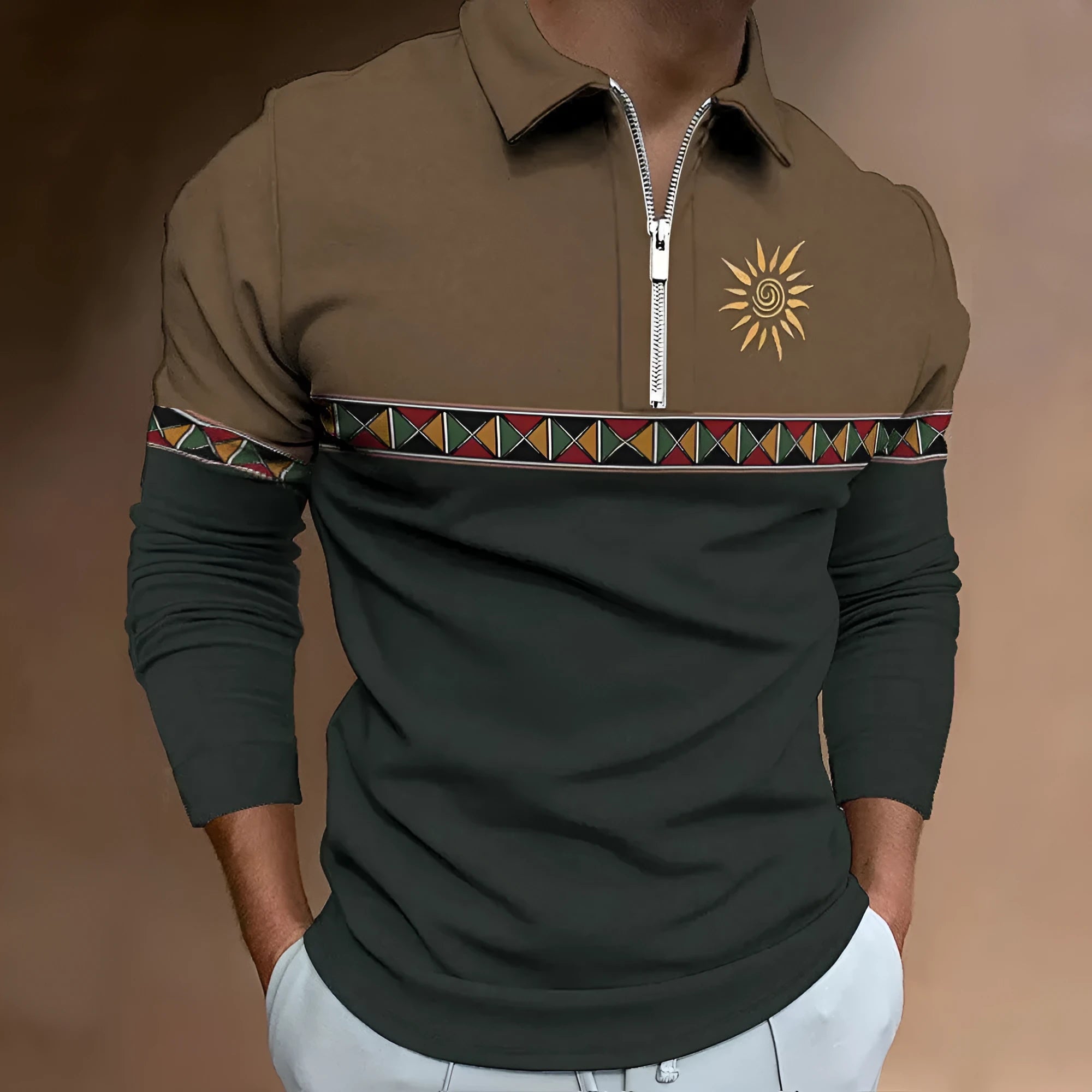 Man wearing a loose-fit long sleeve retro print t-shirt with striped and zipper decorations.