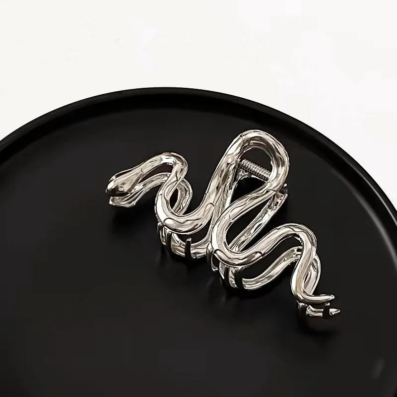 Silver Slytherin serpentine metal hair barrette measuring 10.5 cm in length.