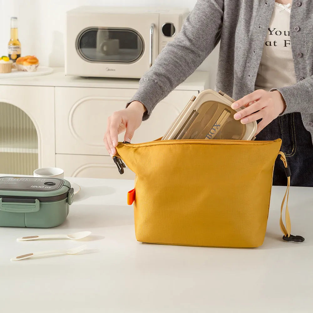 Japanese style insulated storage bag in Oxford cloth with wide opening for food items