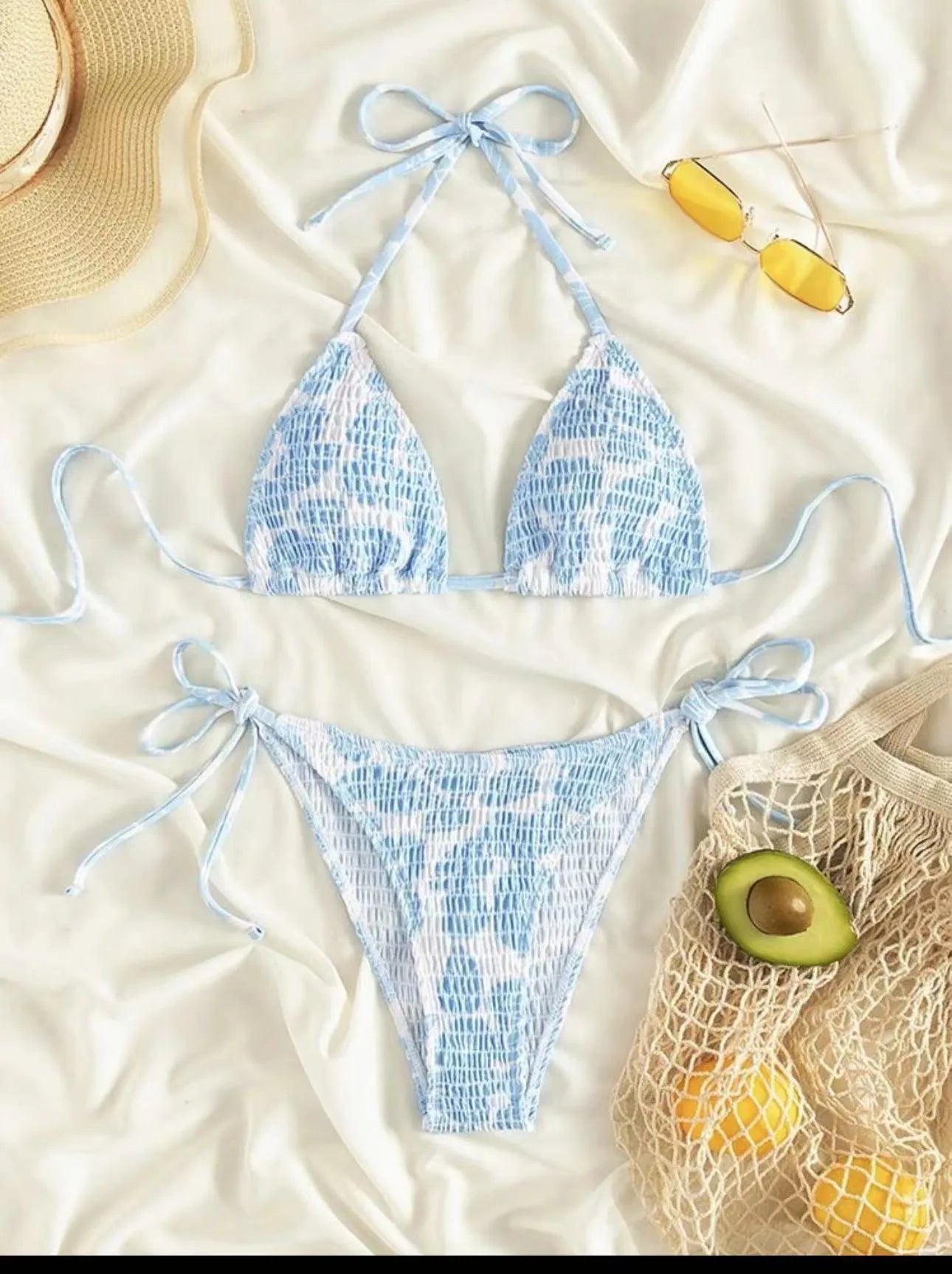 Women's halter neck swimsuit with floral briefs in light blue colour