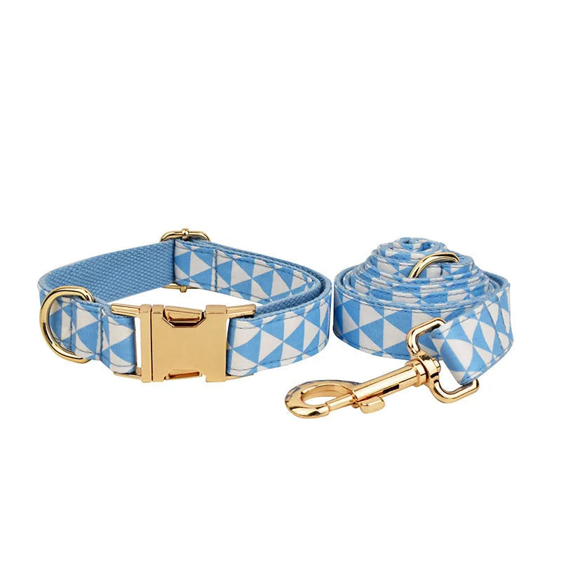 Blue cloth dog accessory set showing vest, collar, leash, and bow for small to medium breeds
